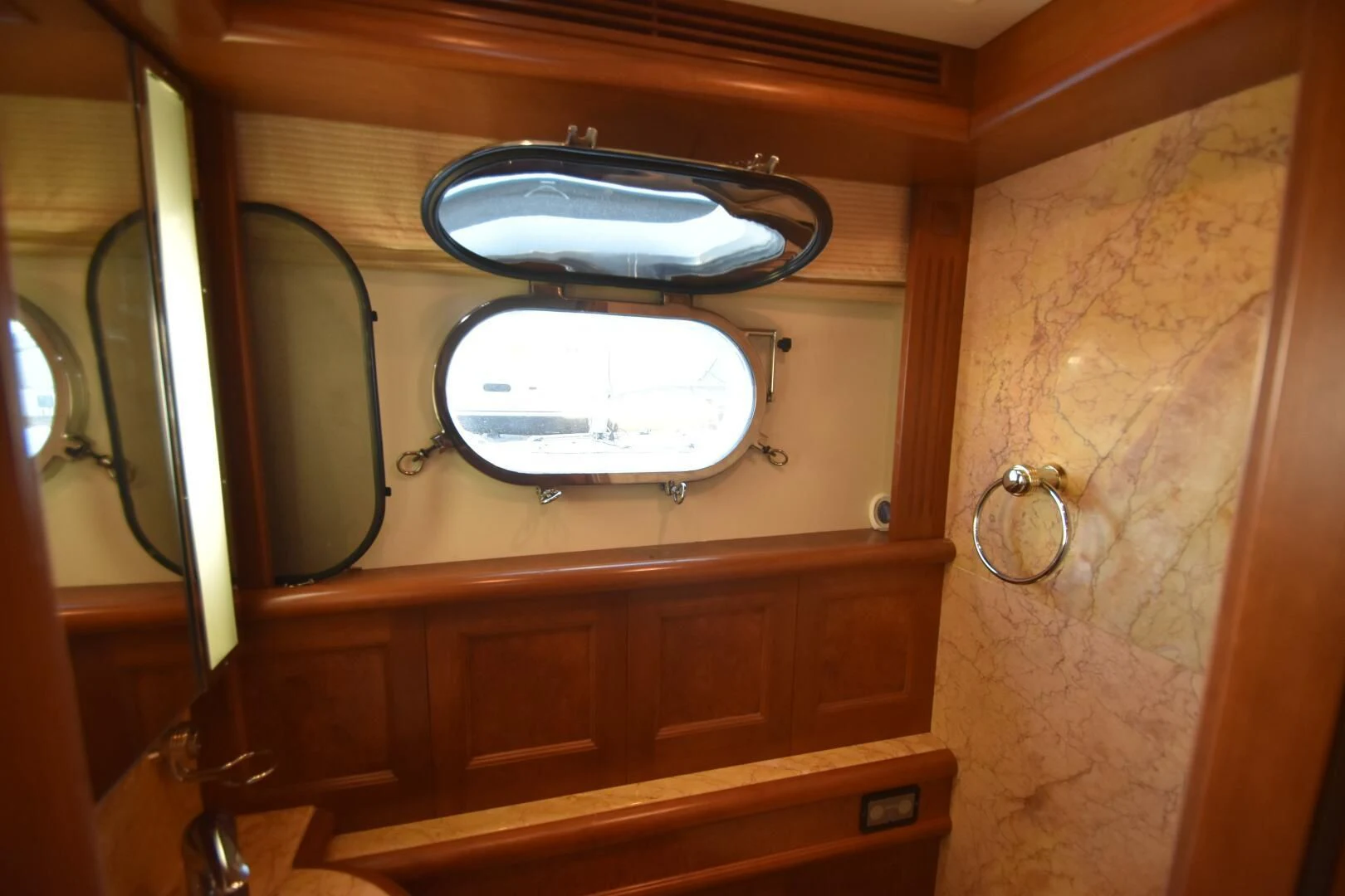 a bathroom with a large mirror aboard BLUE SEAS Yacht for Sale