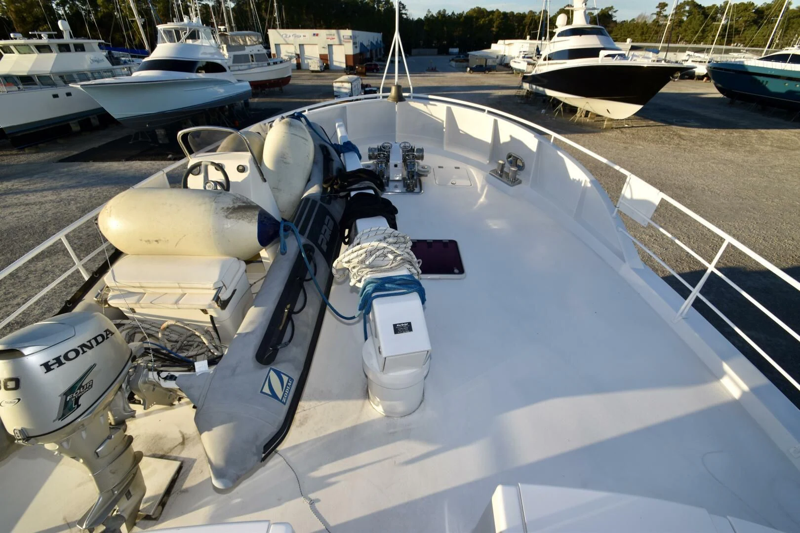 a white boat on a dock aboard BLUE SEAS Yacht for Sale