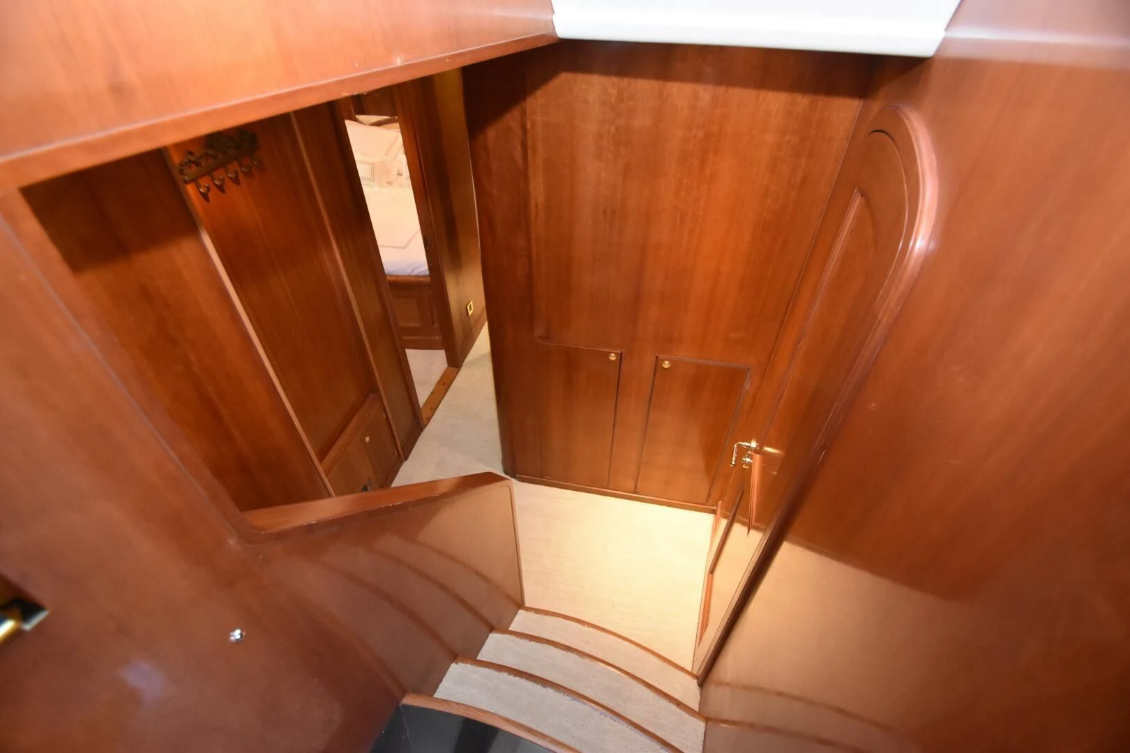 a wooden cabinet with a white rug aboard BLUE SEAS Yacht for Sale