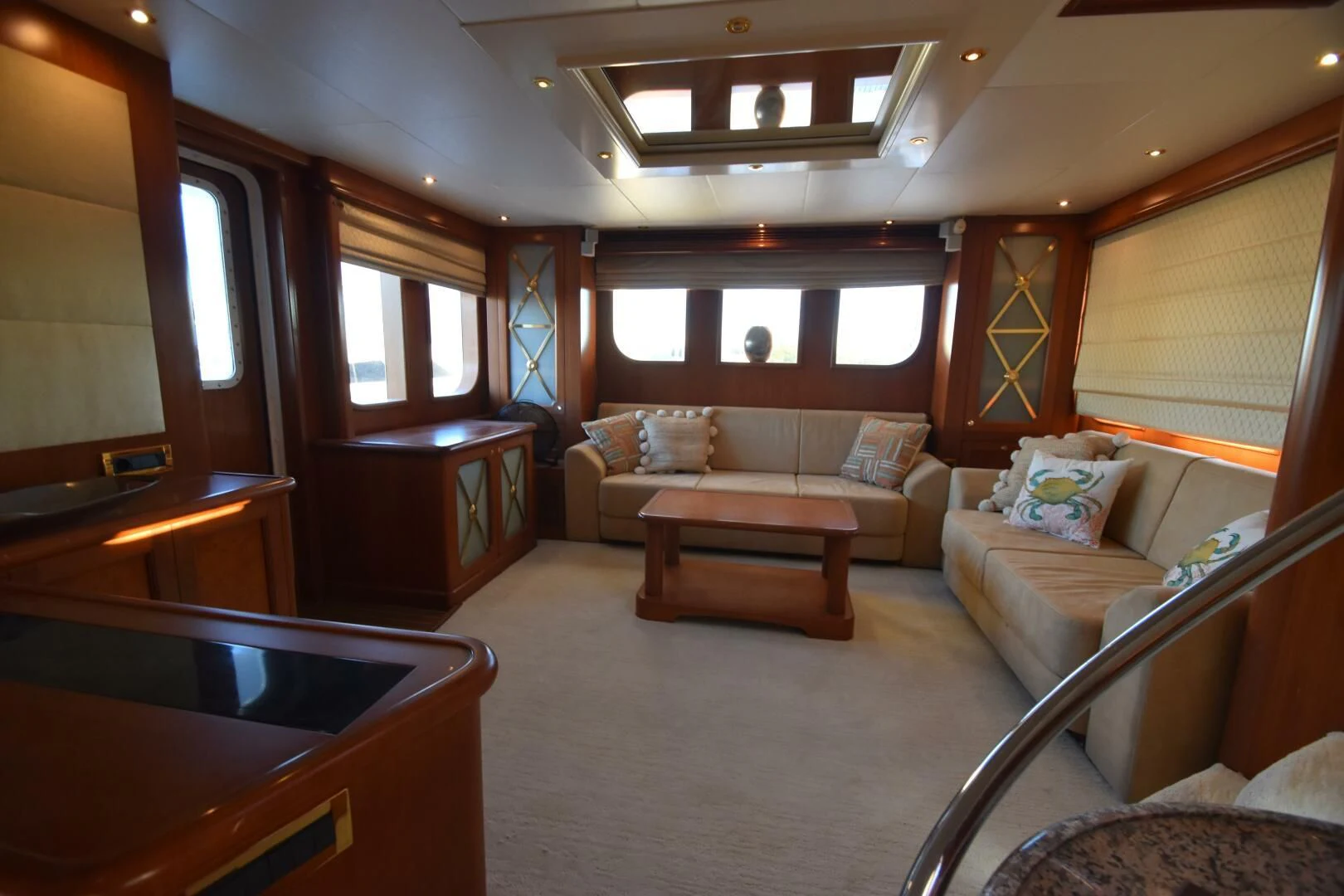 a room with a couch and a table aboard BLUE SEAS Yacht for Sale