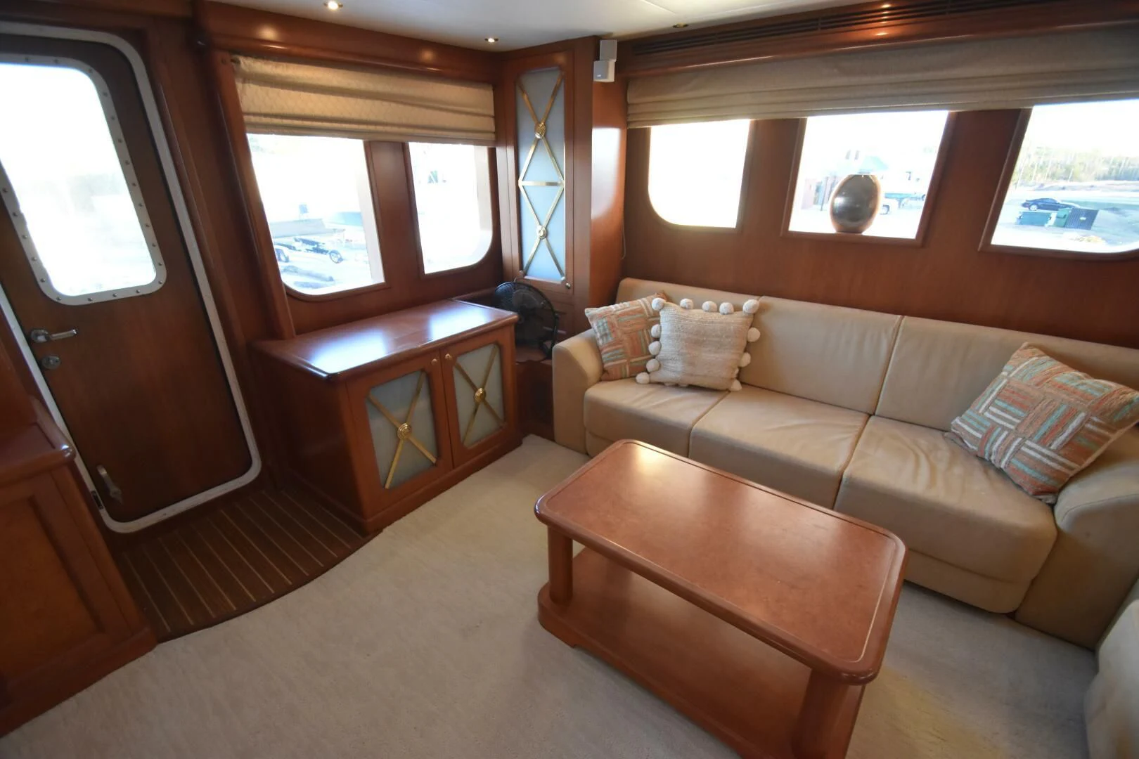 a living room with a couch and a coffee table aboard BLUE SEAS Yacht for Sale
