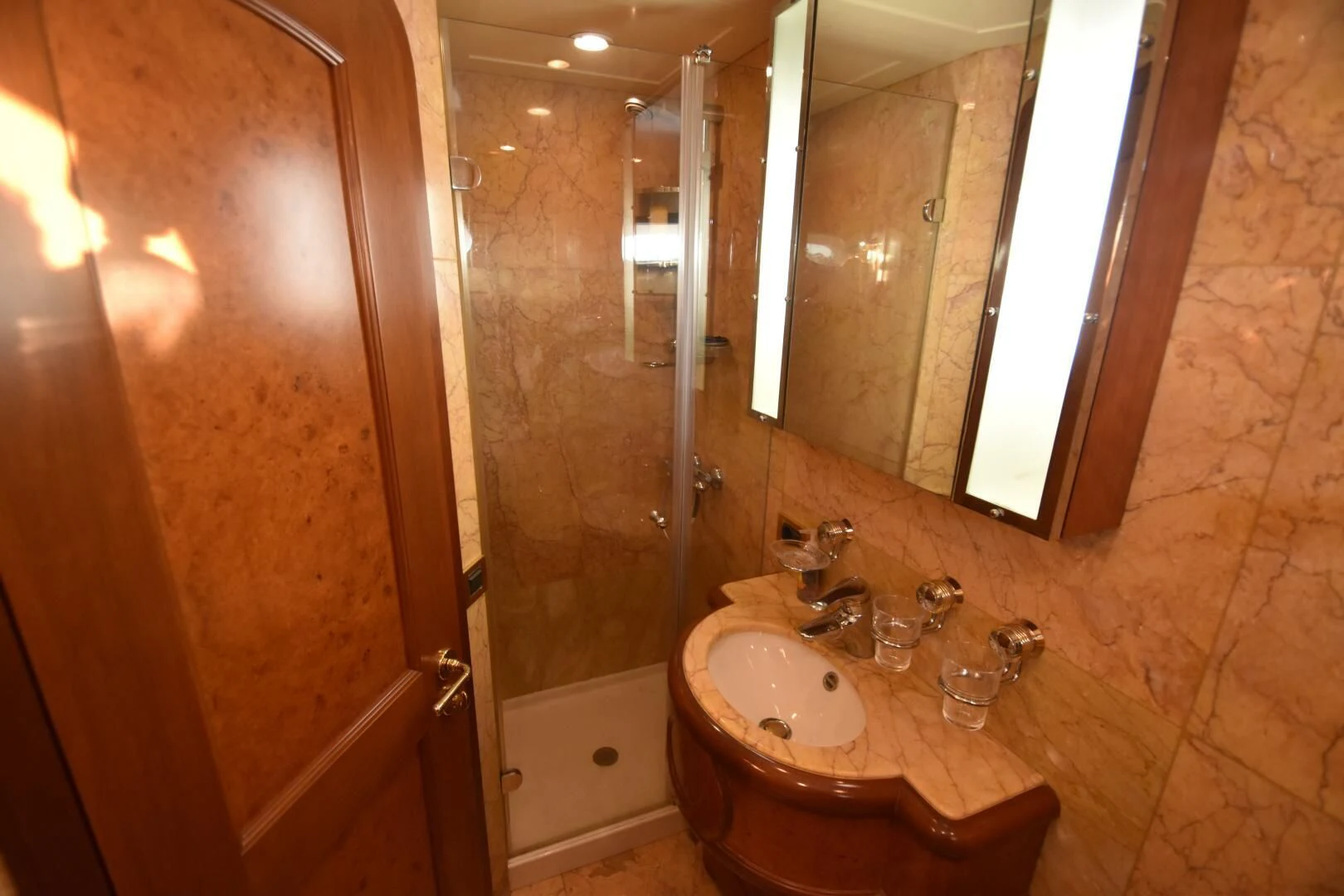 a bathroom with a sink and a shower aboard BLUE SEAS Yacht for Sale