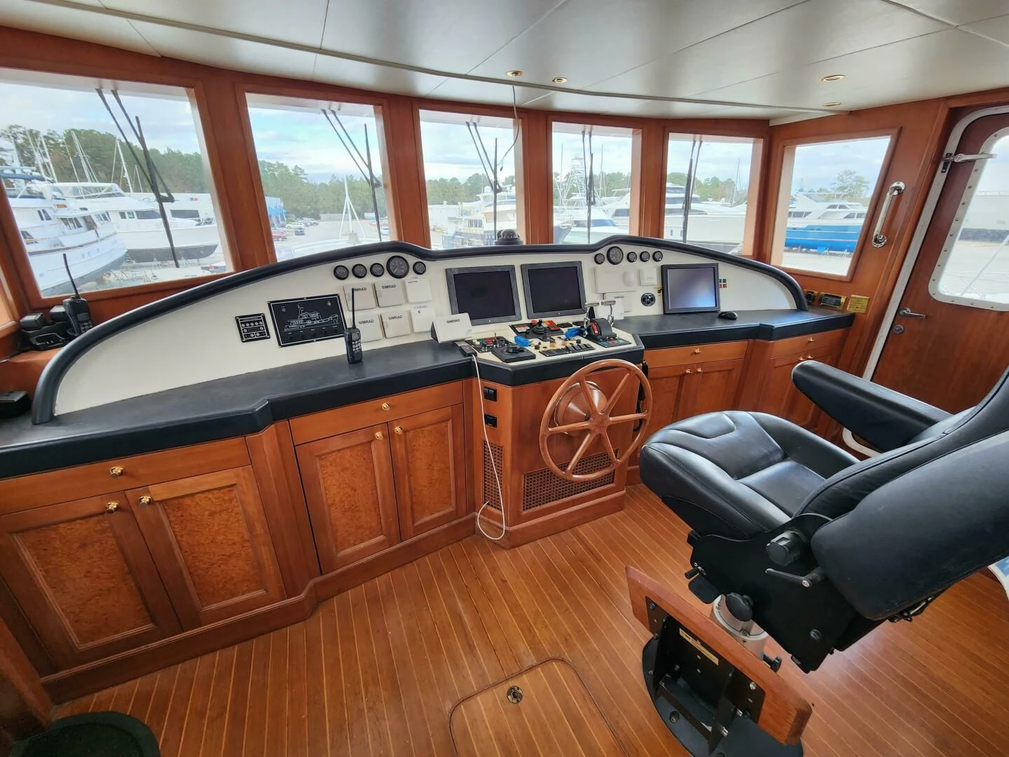 a kitchen with a leather chair aboard BLUE SEAS Yacht for Sale