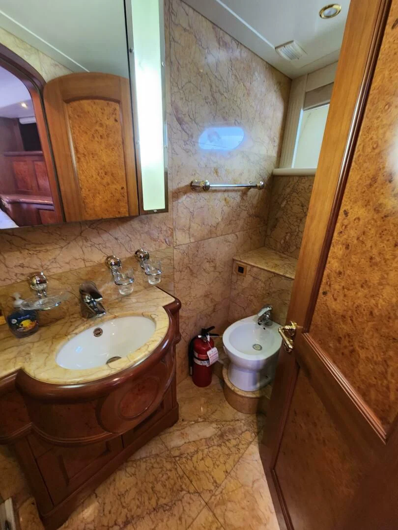 a bathroom with a sink and a toilet aboard BLUE SEAS Yacht for Sale