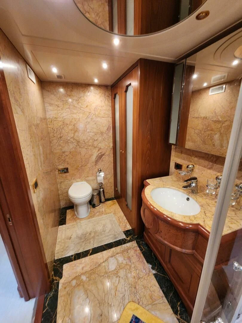 a bathroom with a sink and a toilet aboard BLUE SEAS Yacht for Sale