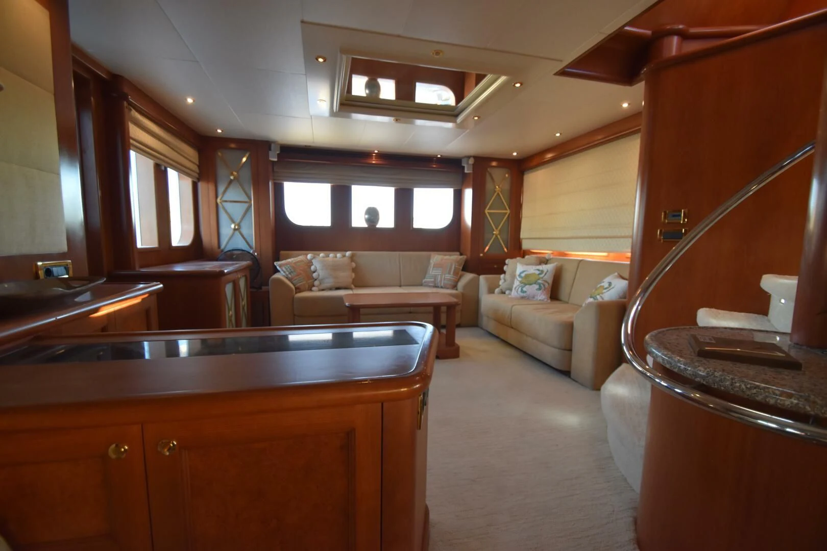 a room with a couch and a table aboard BLUE SEAS Yacht for Sale