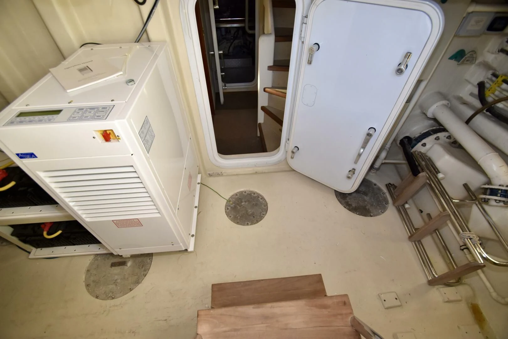 a white machine with a hole in the middle aboard BLUE SEAS Yacht for Sale