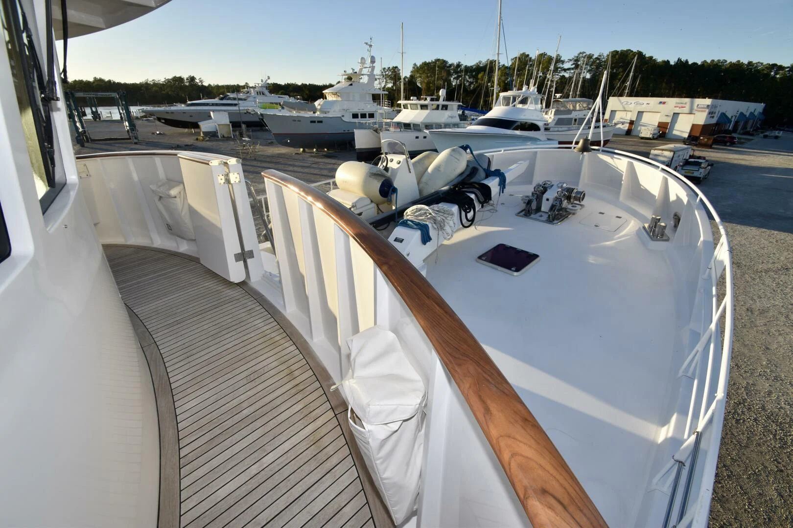 a white boat with a white cover aboard BLUE SEAS Yacht for Sale
