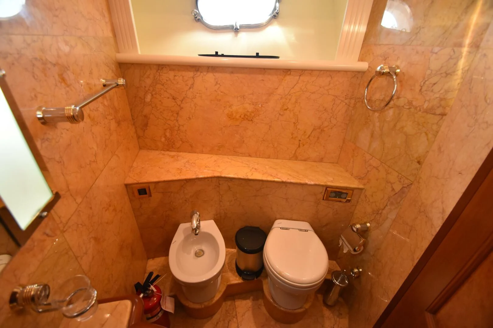 a bathroom with a toilet and a sink aboard BLUE SEAS Yacht for Sale