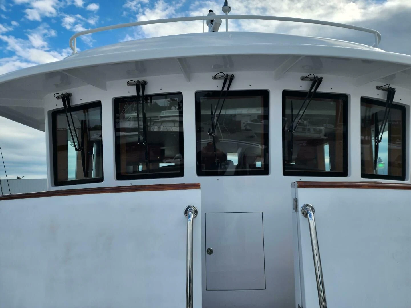 a white boat with windows aboard BLUE SEAS Yacht for Sale