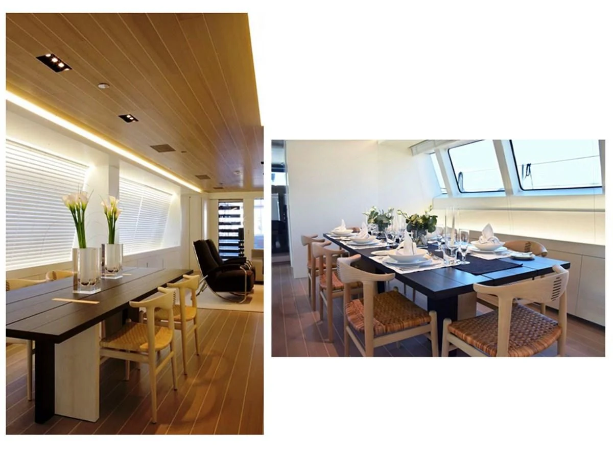 a dining room with a table and chairs aboard BARACUDA VALLETTA Yacht for Sale