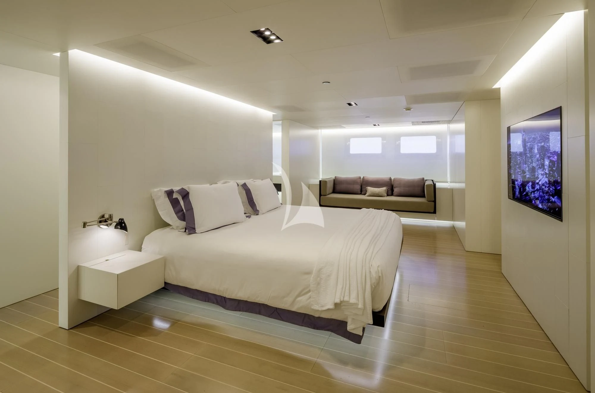 a large bedroom with a large bed aboard BARACUDA VALLETTA Yacht for Sale