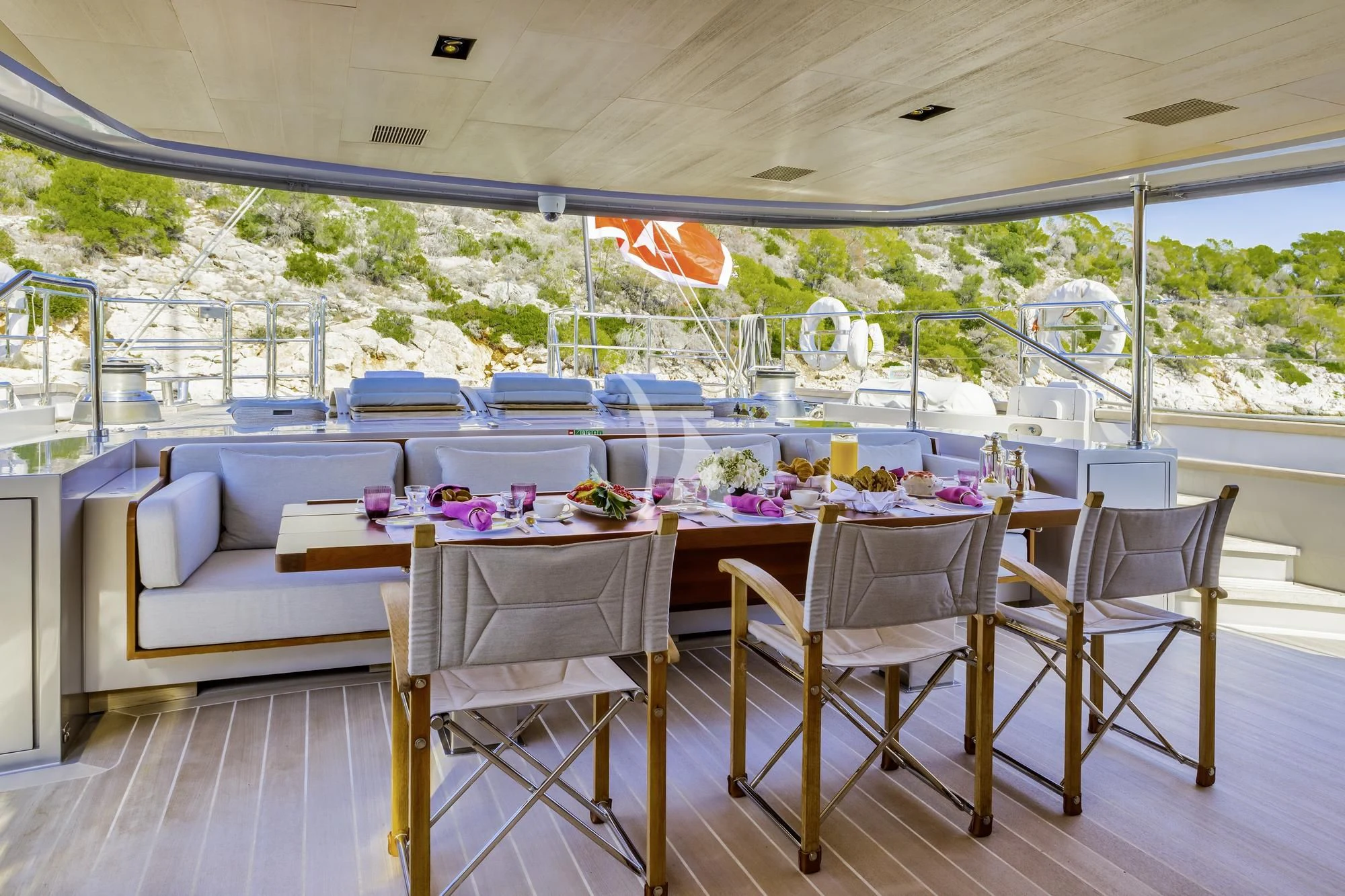 a table set for a meal aboard BARACUDA VALLETTA Yacht for Sale