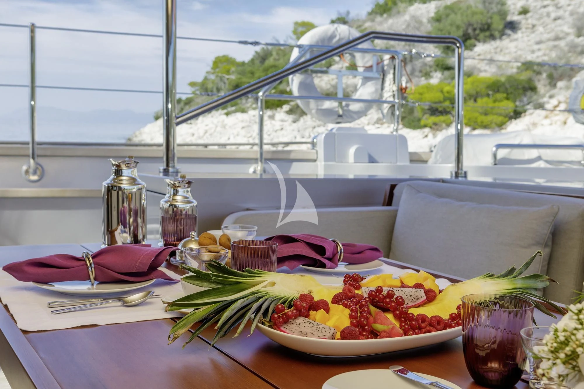 a table with food on it aboard BARACUDA VALLETTA Yacht for Sale