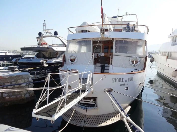 a group of boats are parked in a harbor aboard ETOILE DU NORD Yacht for Sale