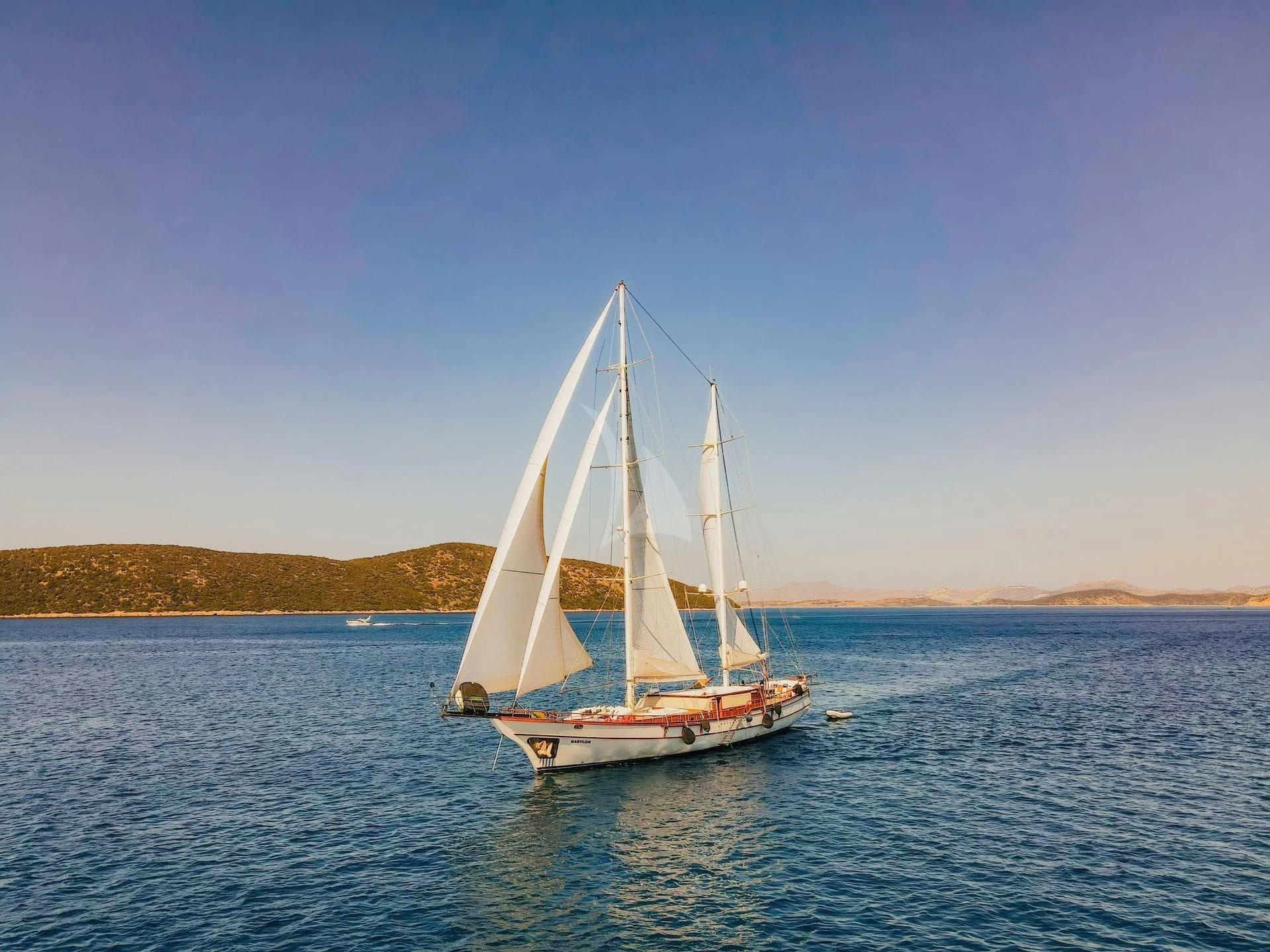 a sailboat in the water aboard BABYLON Yacht for Sale