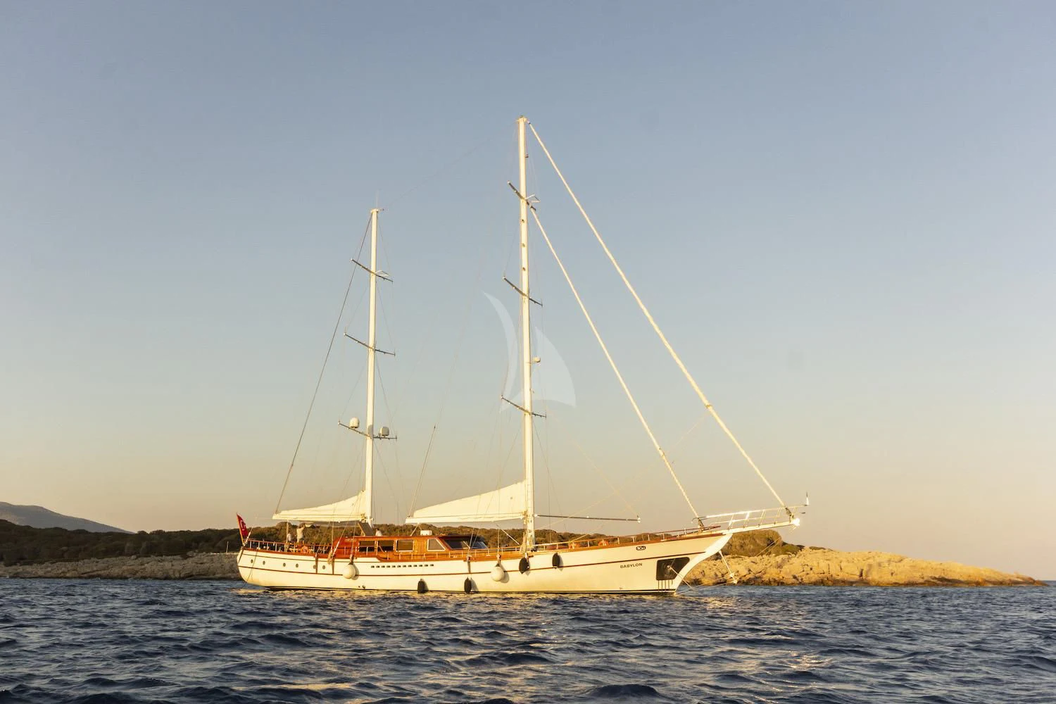 a sailboat on the water aboard BABYLON Yacht for Sale