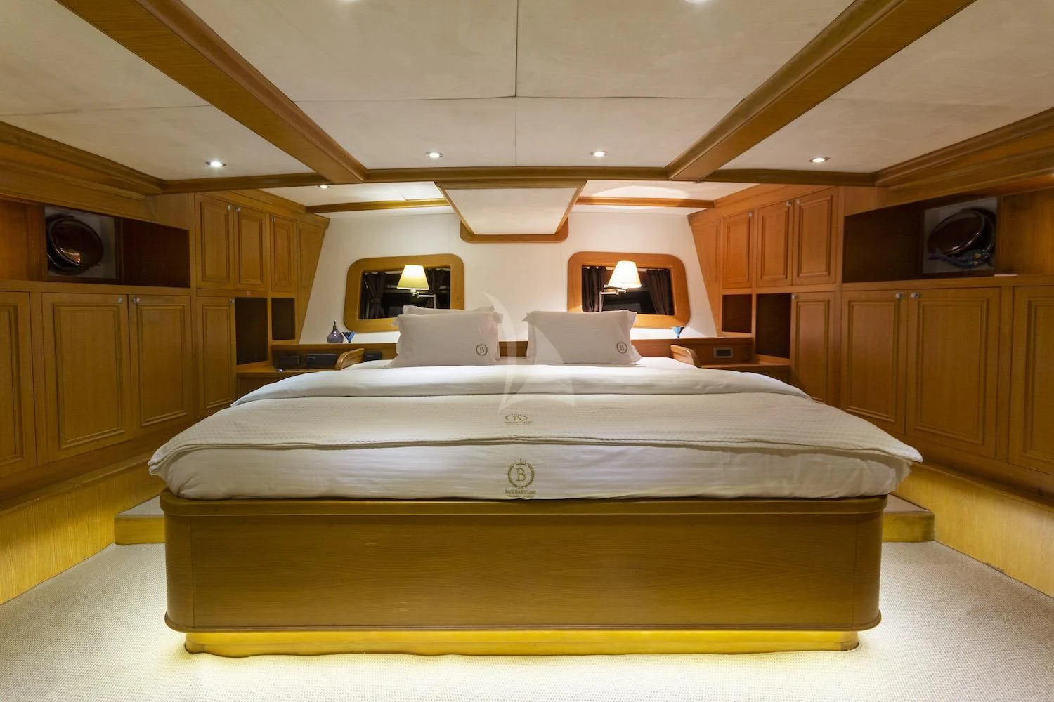 a room with a bed and a television aboard BABYLON Yacht for Sale