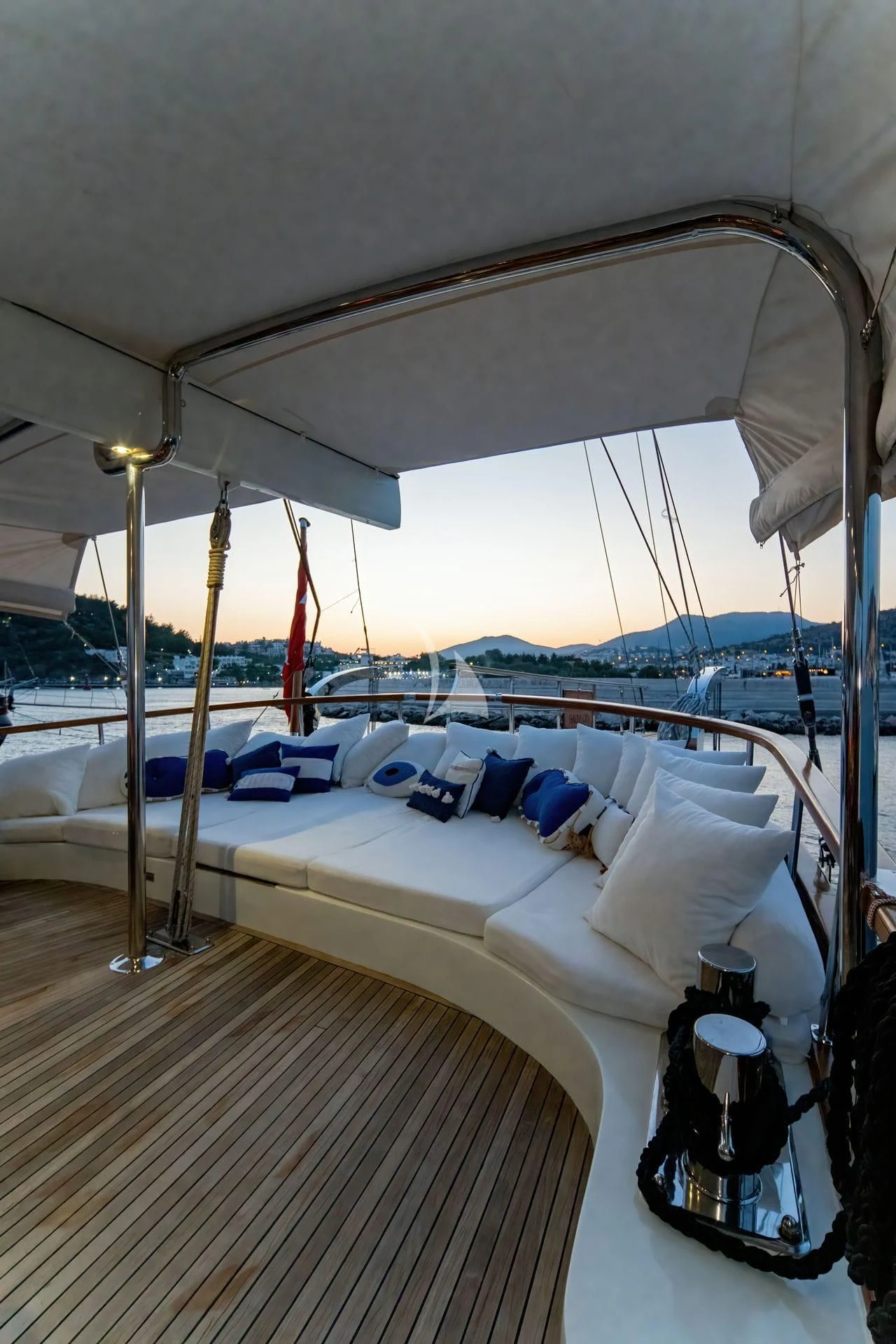 a bed with a canopy over it aboard BABYLON Yacht for Sale