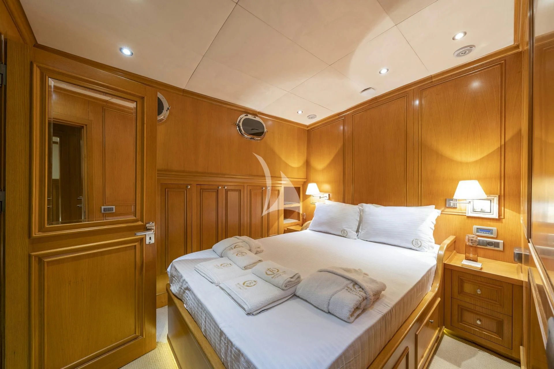 a bed in a room aboard BABYLON Yacht for Sale