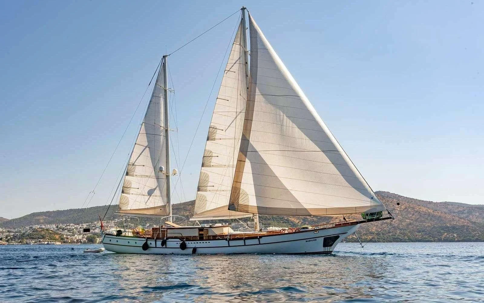 a sailboat on the water aboard BABYLON Yacht for Sale