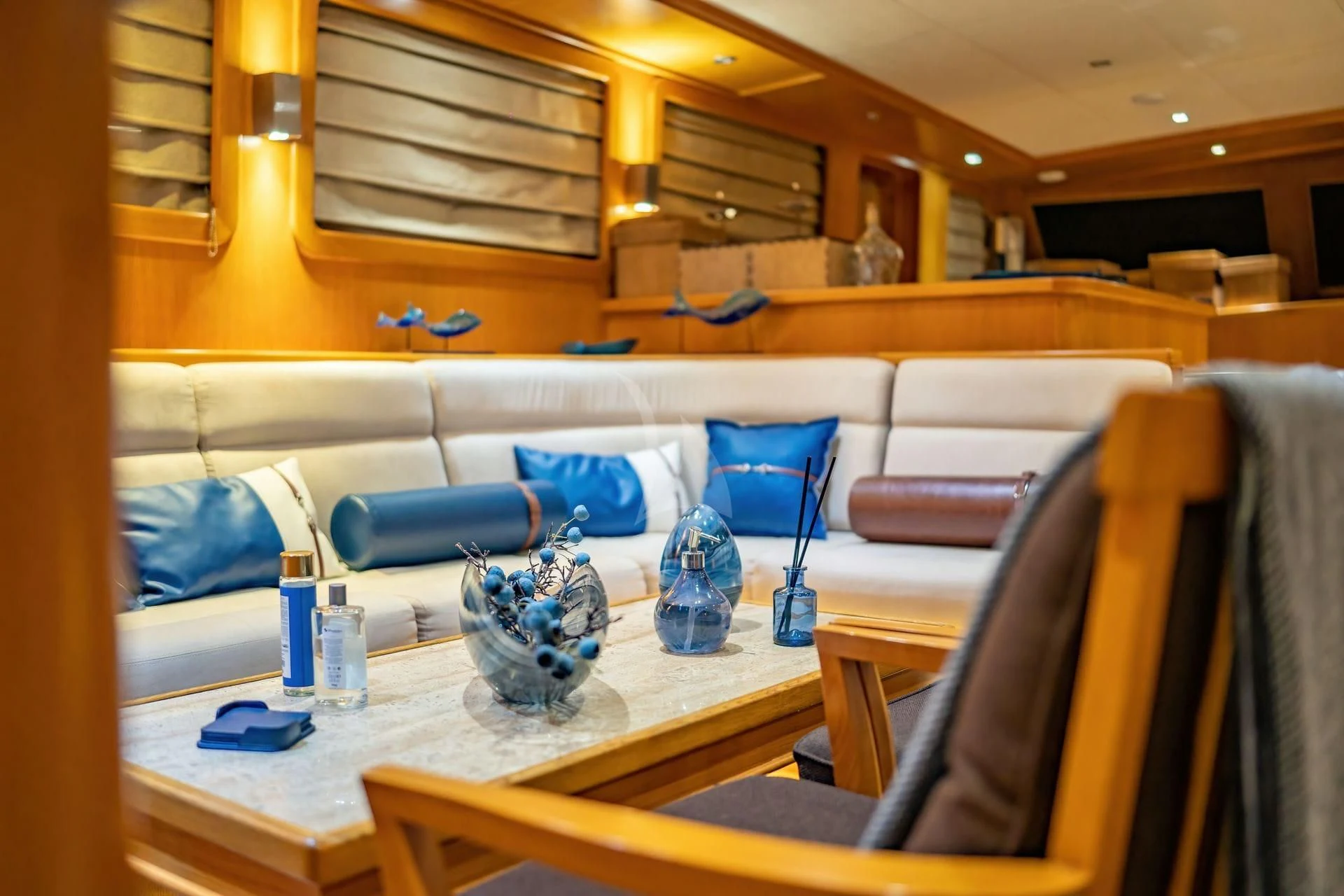 a room with a table and chairs aboard BABYLON Yacht for Sale