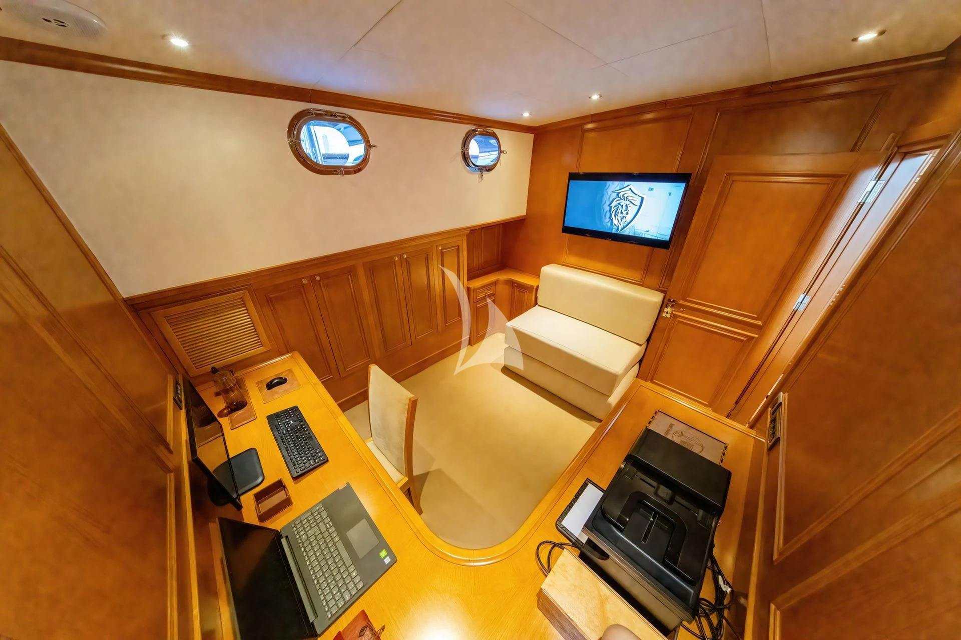 a room with a desk and a computer aboard BABYLON Yacht for Sale