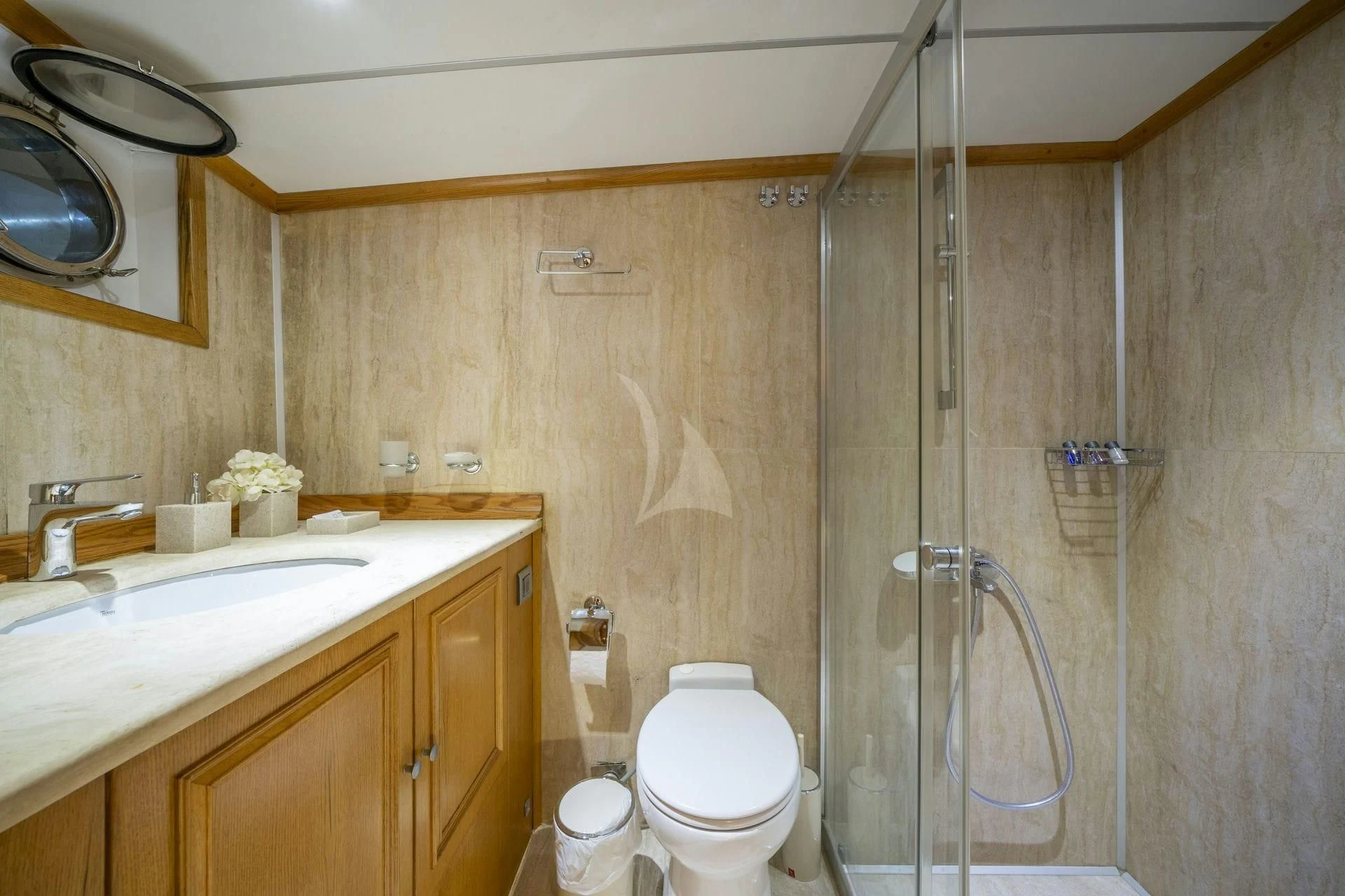 a bathroom with a shower and toilet aboard BABYLON Yacht for Sale