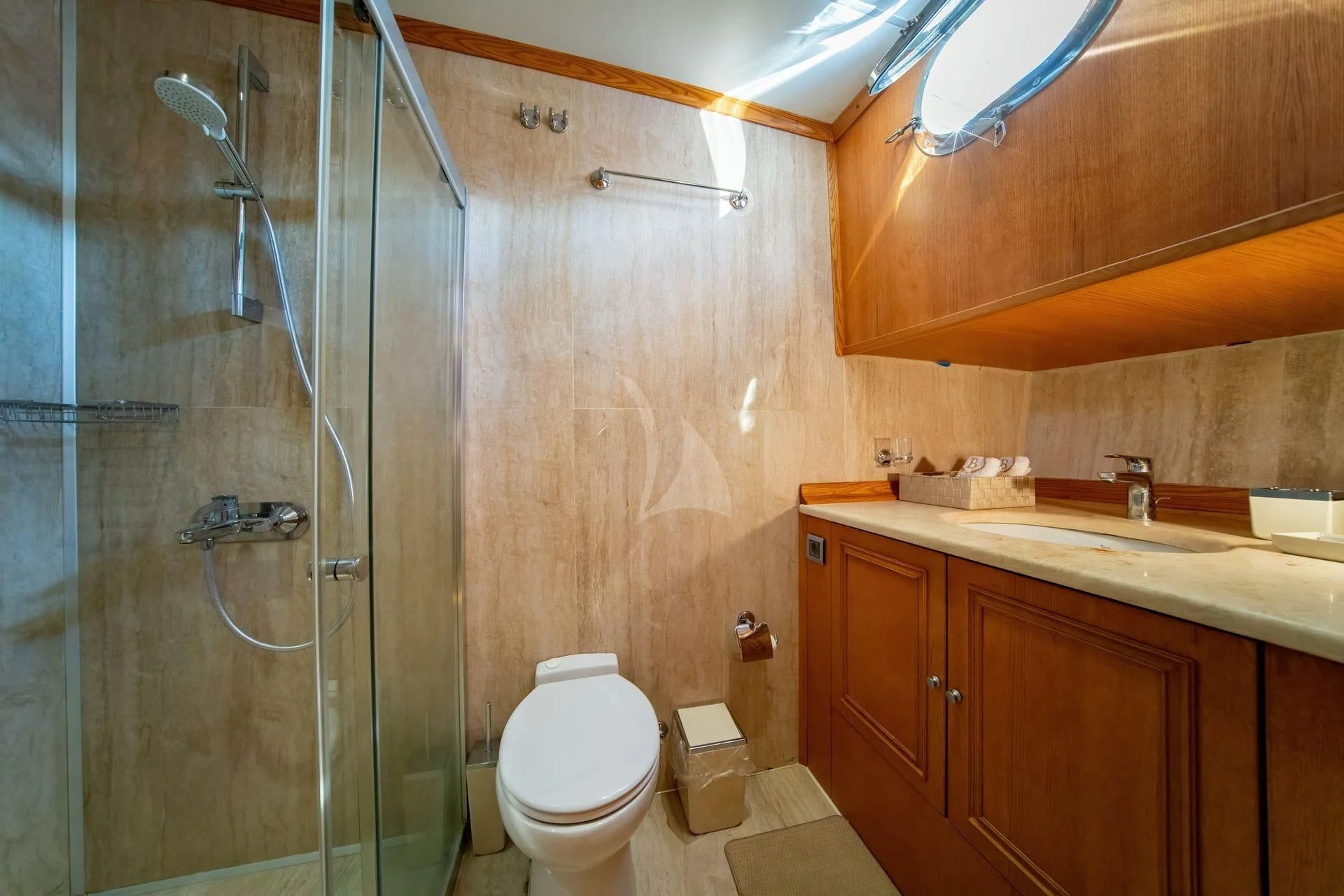 a bathroom with a shower and toilet aboard BABYLON Yacht for Sale