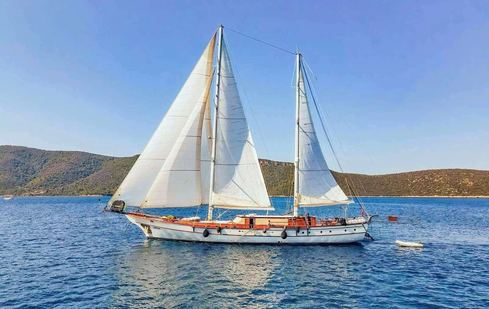 a sailboat on the water aboard BABYLON Yacht for Sale