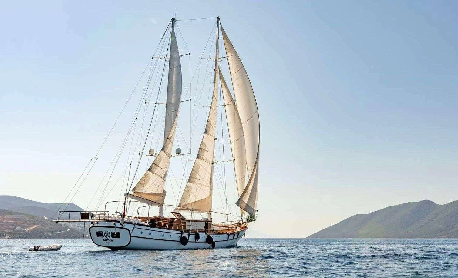 a sailboat on the water aboard BABYLON Yacht for Sale