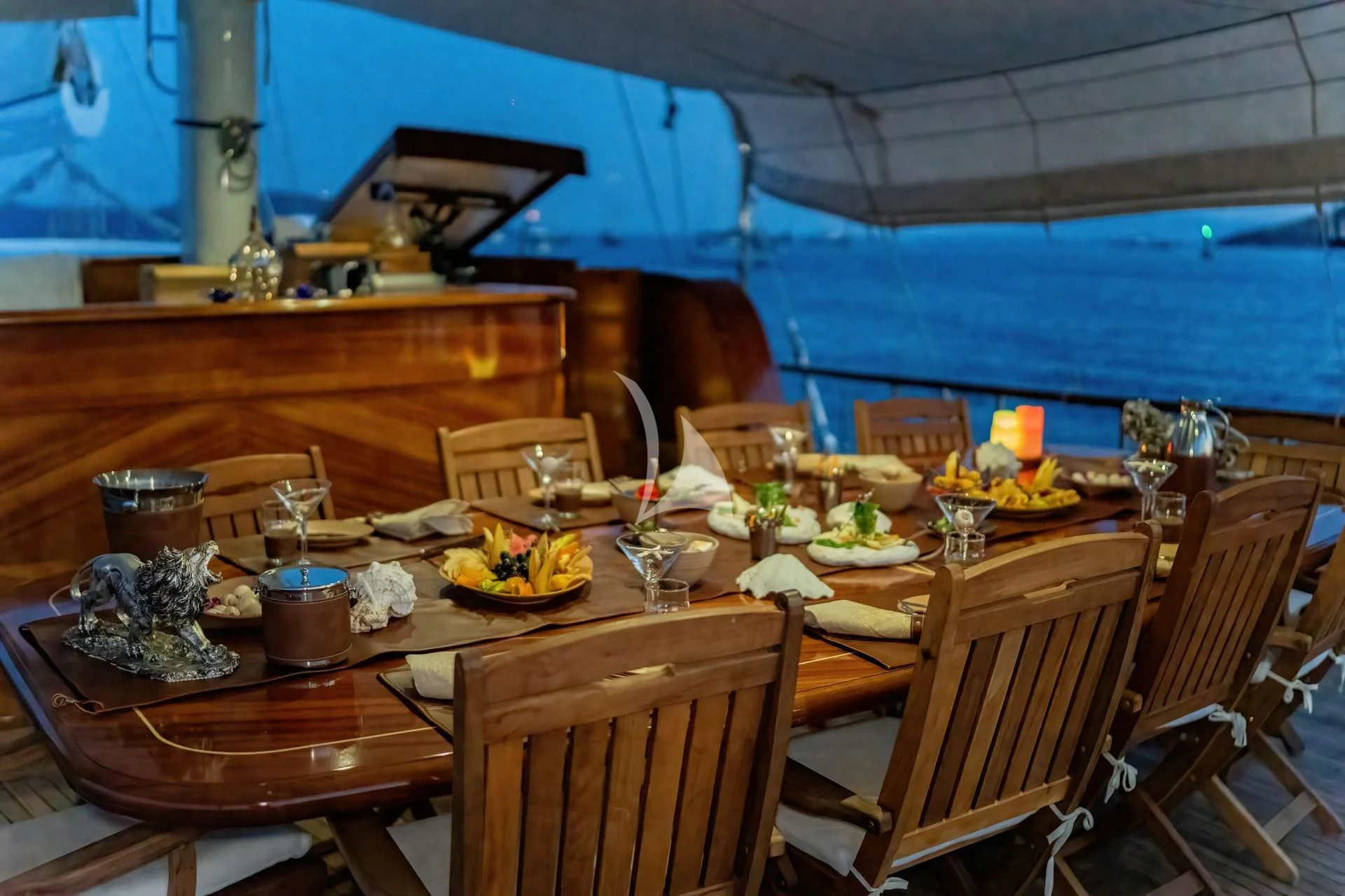 a table set for a dinner aboard BABYLON Yacht for Sale