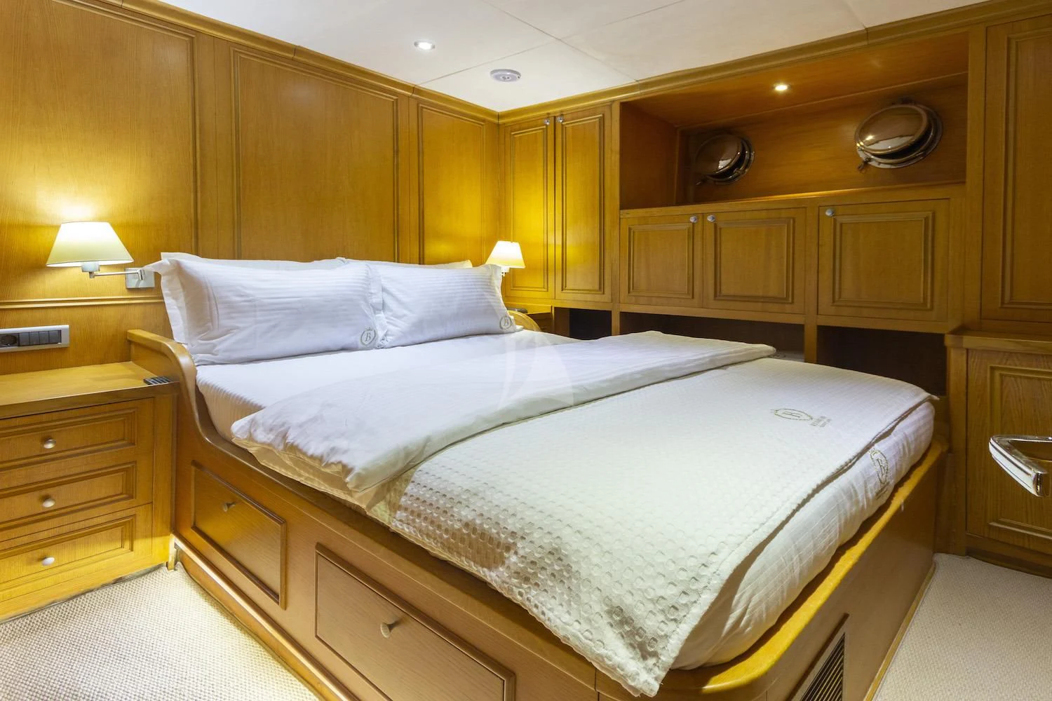 a bed in a room aboard BABYLON Yacht for Sale