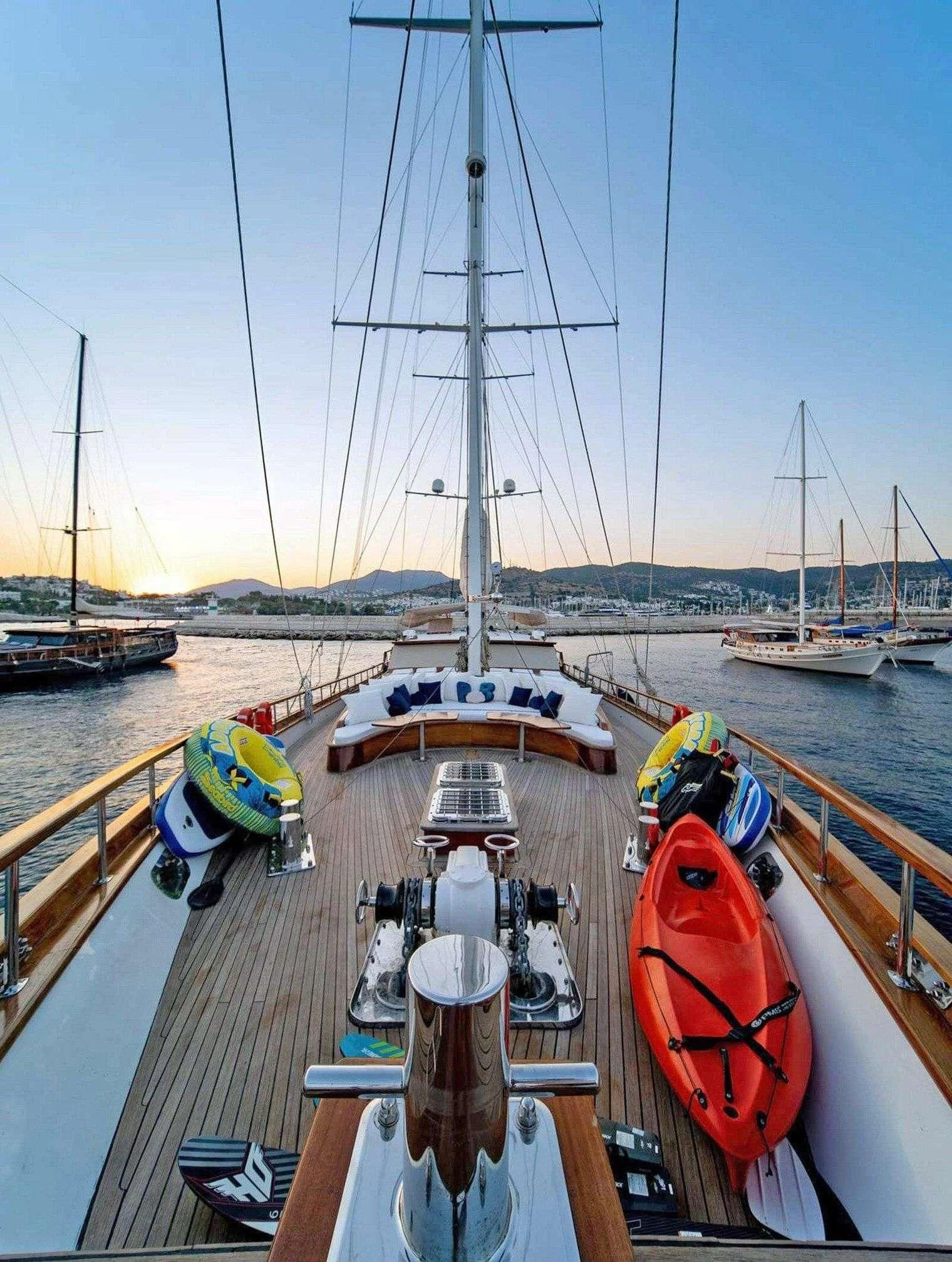 boats docked at a pier aboard BABYLON Yacht for Sale