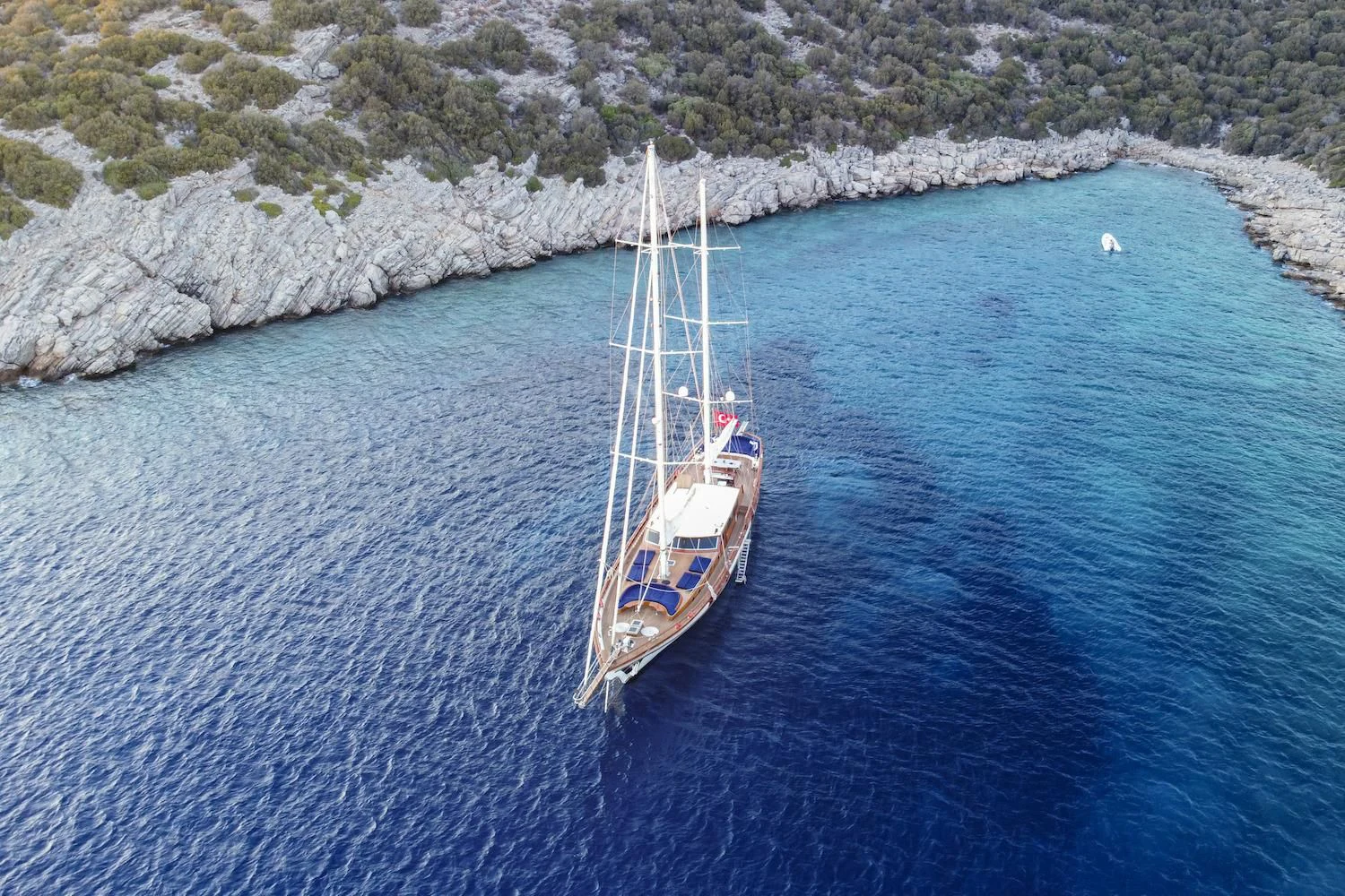 a boat sailing on the water aboard BABYLON Yacht for Sale