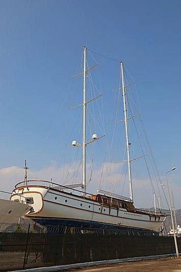 a large ship docked aboard BABYLON Yacht for Sale