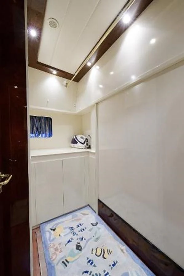 a small bathroom with a rug aboard UTOPIA Yacht for Sale