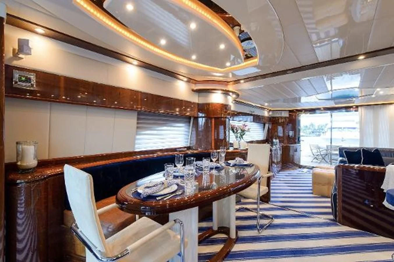 a dining room with a table aboard UTOPIA Yacht for Sale