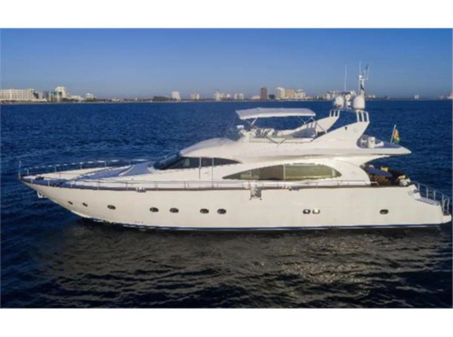 a white yacht in the water aboard UTOPIA Yacht for Sale