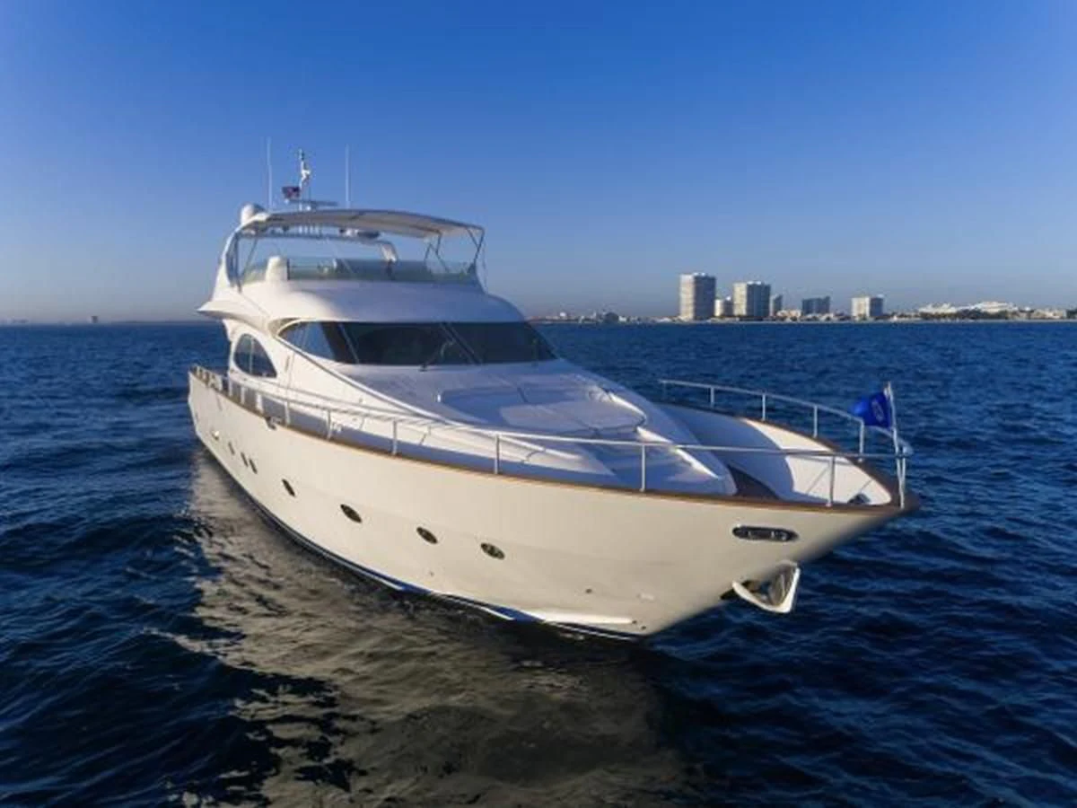 a white yacht on the water aboard UTOPIA Yacht for Sale