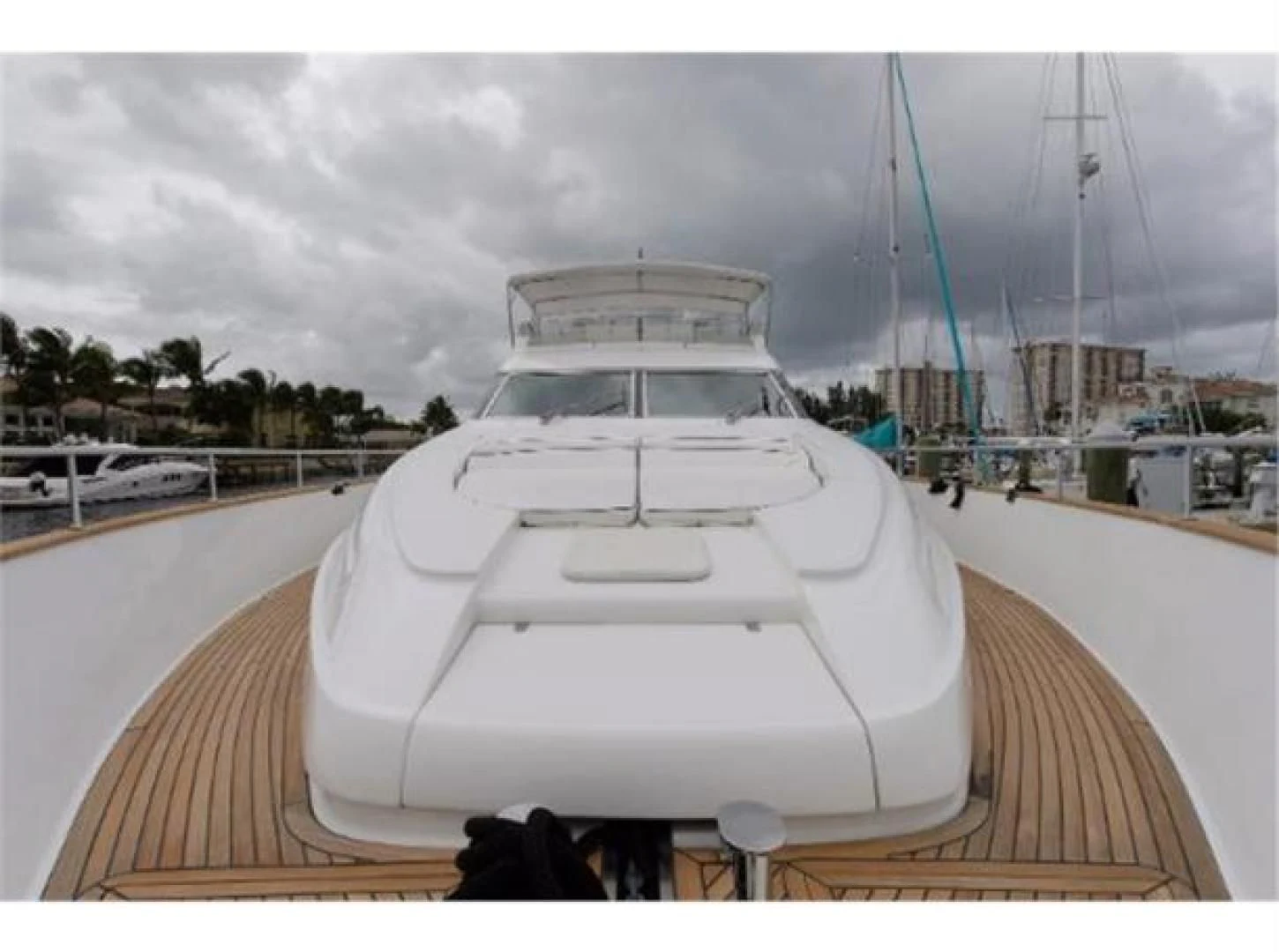 a white boat on a deck aboard UTOPIA Yacht for Sale