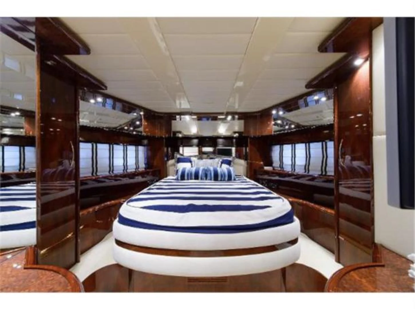 a room with a large mirror aboard UTOPIA Yacht for Sale