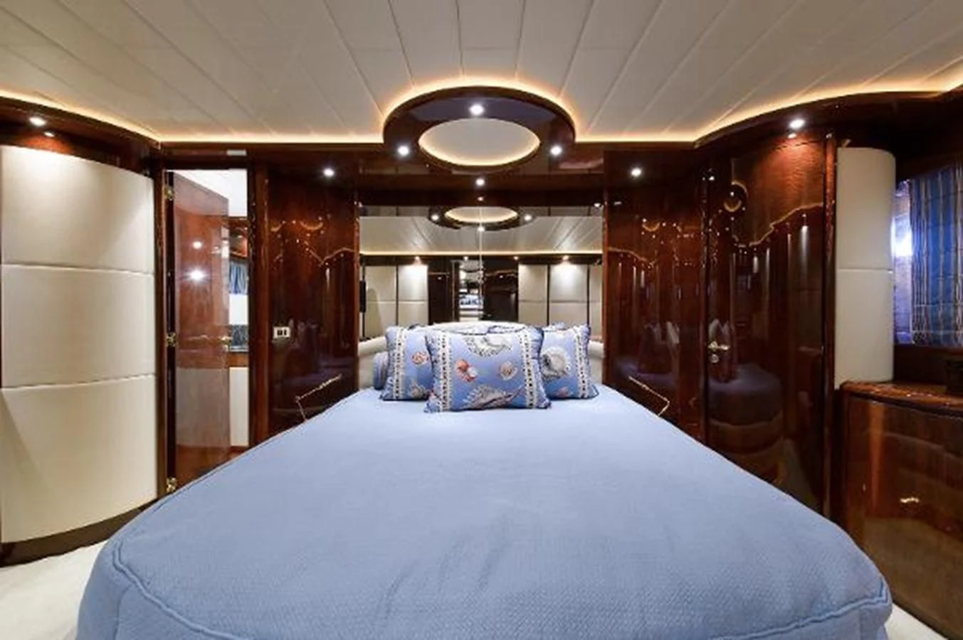 a large bed in a room aboard UTOPIA Yacht for Sale
