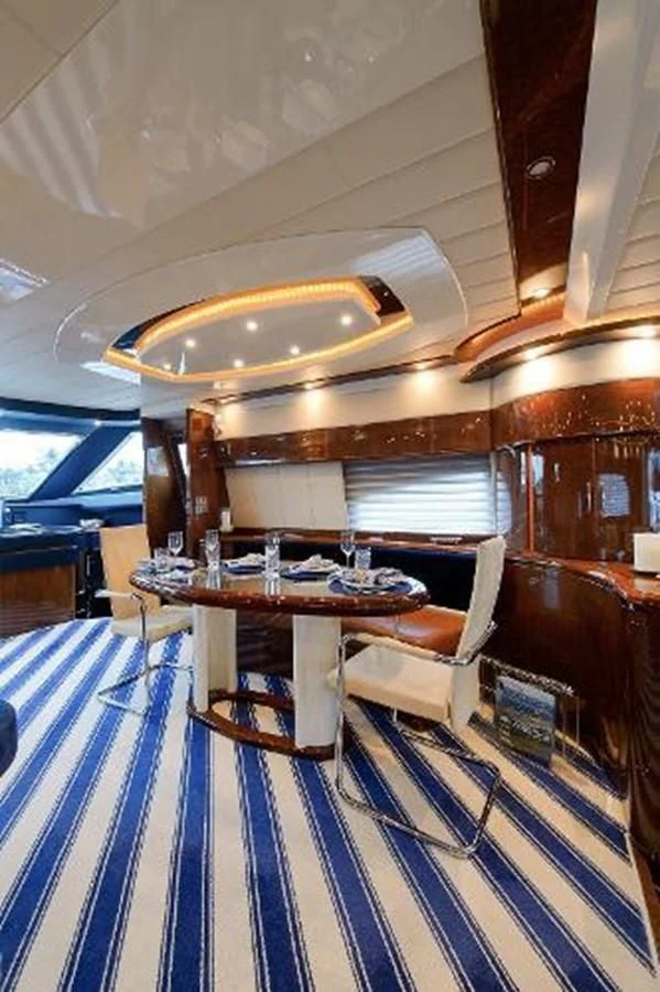a dining table in a boat aboard UTOPIA Yacht for Sale