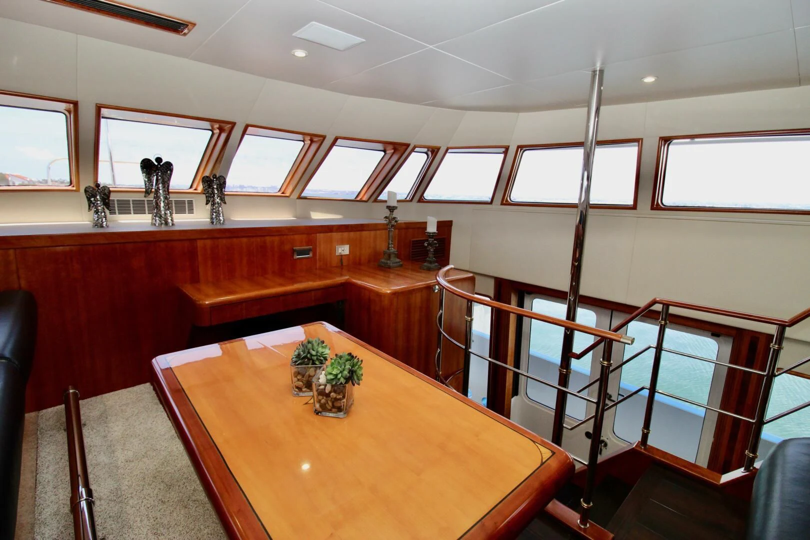 a room with a table and chairs aboard MY WAY Yacht for Sale
