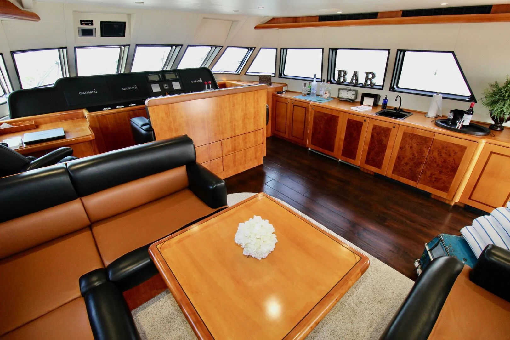 a room with a table and chairs aboard MY WAY Yacht for Sale