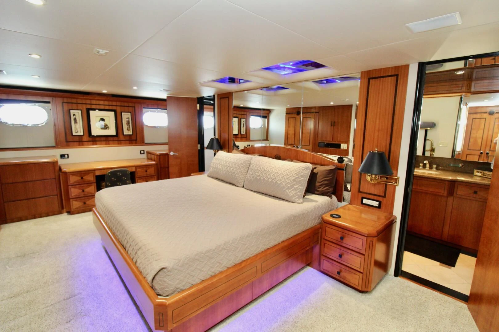 a bedroom with a bed and a desk aboard MY WAY Yacht for Sale