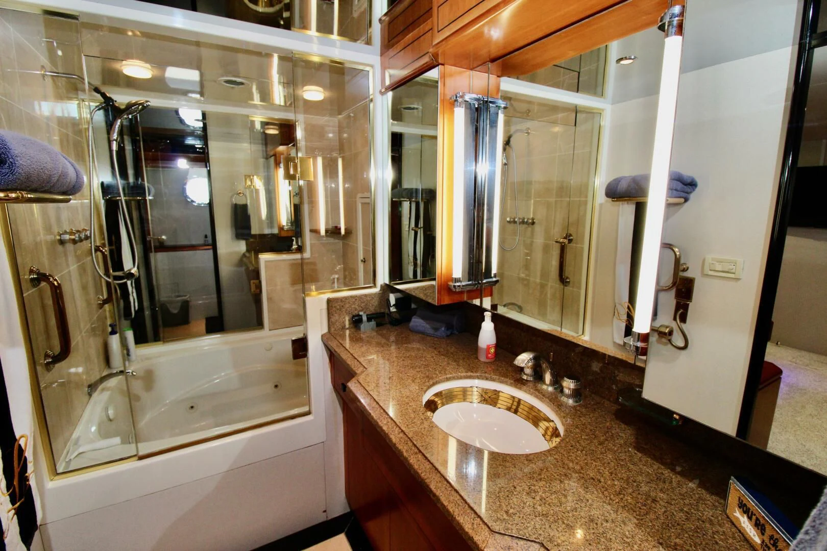 a bathroom with a large mirror aboard MY WAY Yacht for Sale