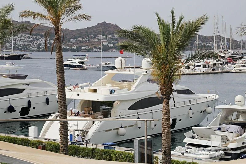 a group of boats are parked at a dock aboard FLOATING ASSET Yacht for Sale