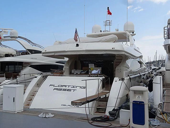 a large white ship aboard FLOATING ASSET Yacht for Sale
